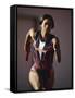 Female Runner Competing in a Track Race-null-Framed Stretched Canvas