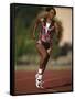 Female Runner Competing in a Track Race-null-Framed Stretched Canvas