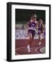 Female Runner Competing in a Track Race-null-Framed Photographic Print