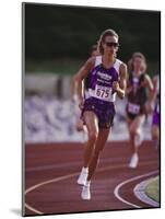 Female Runner Competing in a Track Race-null-Mounted Photographic Print