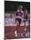 Female Runner Competing in a Track Race-null-Mounted Photographic Print