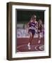 Female Runner Competing in a Track Race-null-Framed Photographic Print