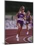 Female Runner Competing in a Track Race-null-Mounted Photographic Print