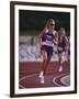 Female Runner Competing in a Track Race-null-Framed Photographic Print