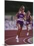 Female Runner Competing in a Track Race-null-Mounted Photographic Print