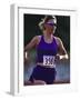 Female Runner Competing in a Track Race-null-Framed Photographic Print