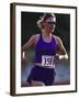 Female Runner Competing in a Track Race-null-Framed Photographic Print