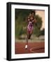 Female Runner Competing in a Track Race-null-Framed Photographic Print