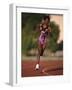 Female Runner Competing in a Track Race-null-Framed Photographic Print