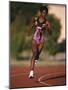 Female Runner Competing in a Track Race-null-Mounted Photographic Print