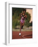 Female Runner Competing in a Track Race-null-Framed Photographic Print