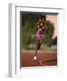 Female Runner Competing in a Track Race-null-Framed Photographic Print
