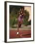 Female Runner Competing in a Track Race-null-Framed Photographic Print