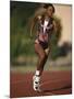 Female Runner Competing in a Track Race-null-Mounted Photographic Print