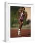 Female Runner Competing in a Track Race-null-Framed Photographic Print