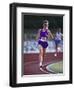 Female Runner Competing in a Track Race-null-Framed Photographic Print