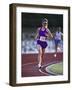 Female Runner Competing in a Track Race-null-Framed Photographic Print