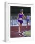 Female Runner Competing in a Track Race-null-Framed Photographic Print