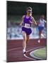 Female Runner Competing in a Track Race-null-Mounted Photographic Print