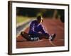 Female Runner Stretching While Training on the Track-null-Framed Photographic Print