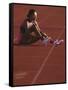 Female Runner Takinfg a Break During Training-null-Framed Stretched Canvas