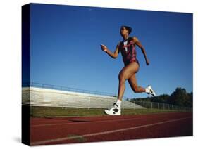 Female Runner Training on the Track-null-Stretched Canvas