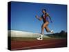 Female Runner Training on the Track-null-Stretched Canvas