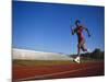 Female Runner Training on the Track-null-Mounted Photographic Print