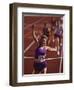 Female Runner Victorious at the Finish Line in a Track Race-null-Framed Premium Photographic Print