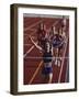 Female Runner Victorious at the Finish Line in a Track Race-null-Framed Photographic Print