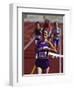 Female Runner Victorious at the Finish Line in a Track Race-null-Framed Photographic Print