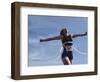 Female Runner Victorious at the Finish Line in a Track Race-null-Framed Photographic Print