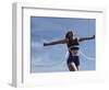 Female Runner Victorious at the Finish Line in a Track Race-null-Framed Photographic Print