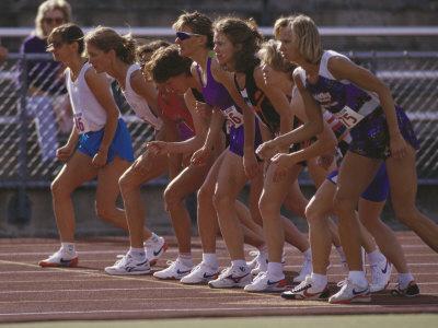 https://imgc.allpostersimages.com/img/posters/female-runners-at-the-start-of-a-track-race_u-L-Q10TY610.jpg?artPerspective=n