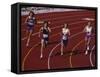 Female Runners Competing in a Track Race-null-Framed Stretched Canvas