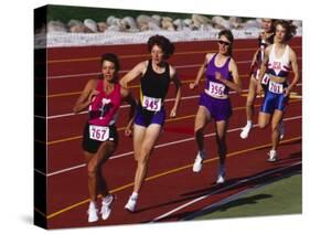 Female Runners Competing in a Track Race-null-Stretched Canvas