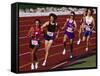 Female Runners Competing in a Track Race-null-Framed Stretched Canvas