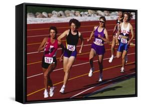 Female Runners Competing in a Track Race-null-Framed Stretched Canvas