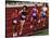 Female Runners Competing in a Track Race-null-Stretched Canvas