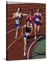 Female Runners Competing in a Track Race-null-Stretched Canvas