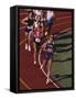 Female Runners Competing in a Track Race-null-Framed Stretched Canvas