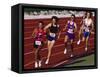 Female Runners Competing in a Track Race-null-Framed Stretched Canvas