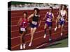 Female Runners Competing in a Track Race-null-Stretched Canvas