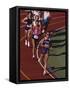 Female Runners Competing in a Track Race-null-Framed Stretched Canvas