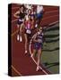 Female Runners Competing in a Track Race-null-Stretched Canvas