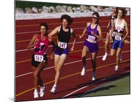 Female Runners Competing in a Track Race-null-Mounted Photographic Print