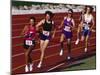 Female Runners Competing in a Track Race-null-Mounted Photographic Print