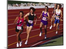 Female Runners Competing in a Track Race-null-Mounted Photographic Print