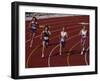 Female Runners Competing in a Track Race-null-Framed Photographic Print