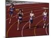 Female Runners Competing in a Track Race-null-Mounted Photographic Print